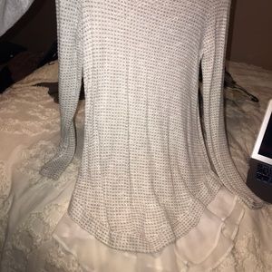 Sweater with white trim at the bottom